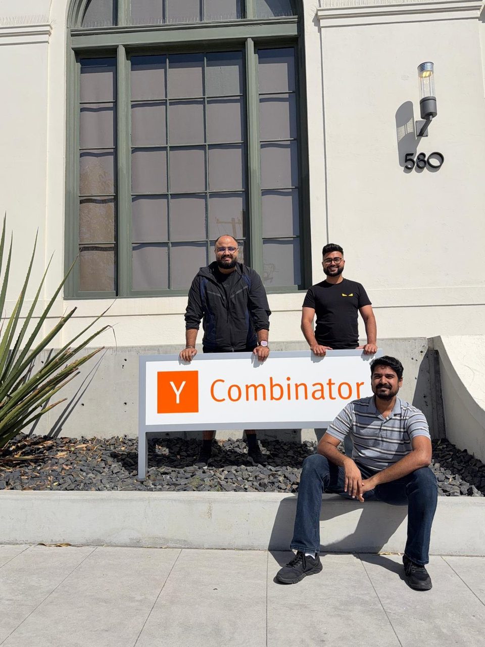 Sid Ravikumar, Sajan Khosa and Arsh Sekhon with the Y Combinator sign